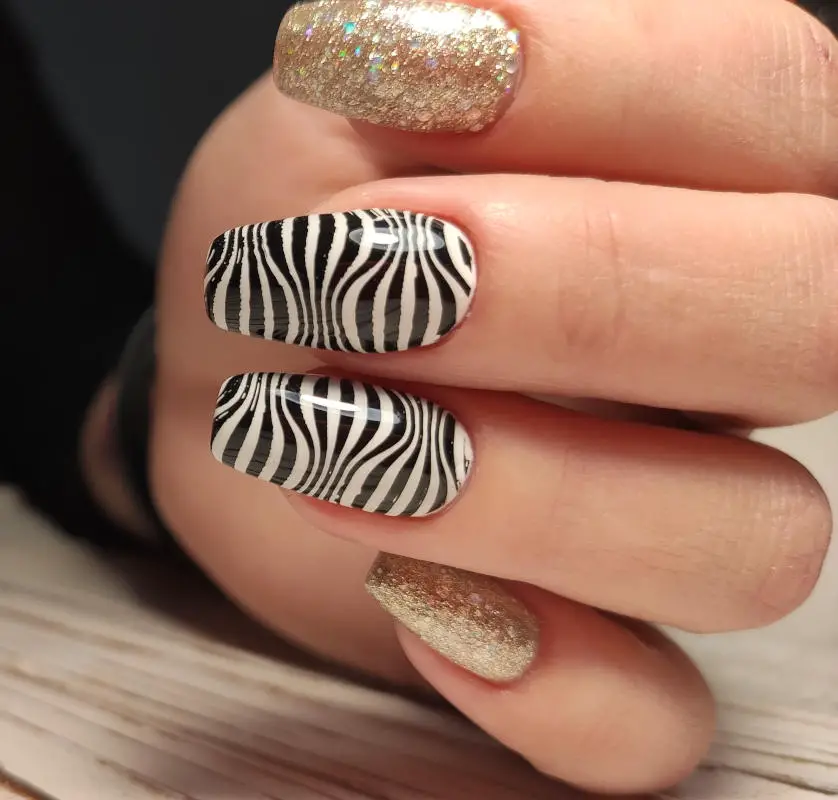 Wild and Glamorous Animal Print Nails Combined with Gold Glitter Nails |  Nail Salon Pro